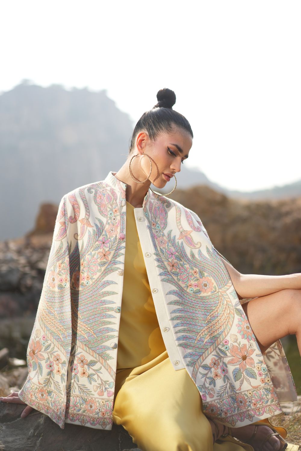 JOBAN SANDHU IN PAISLEY SWIRL CAPE
