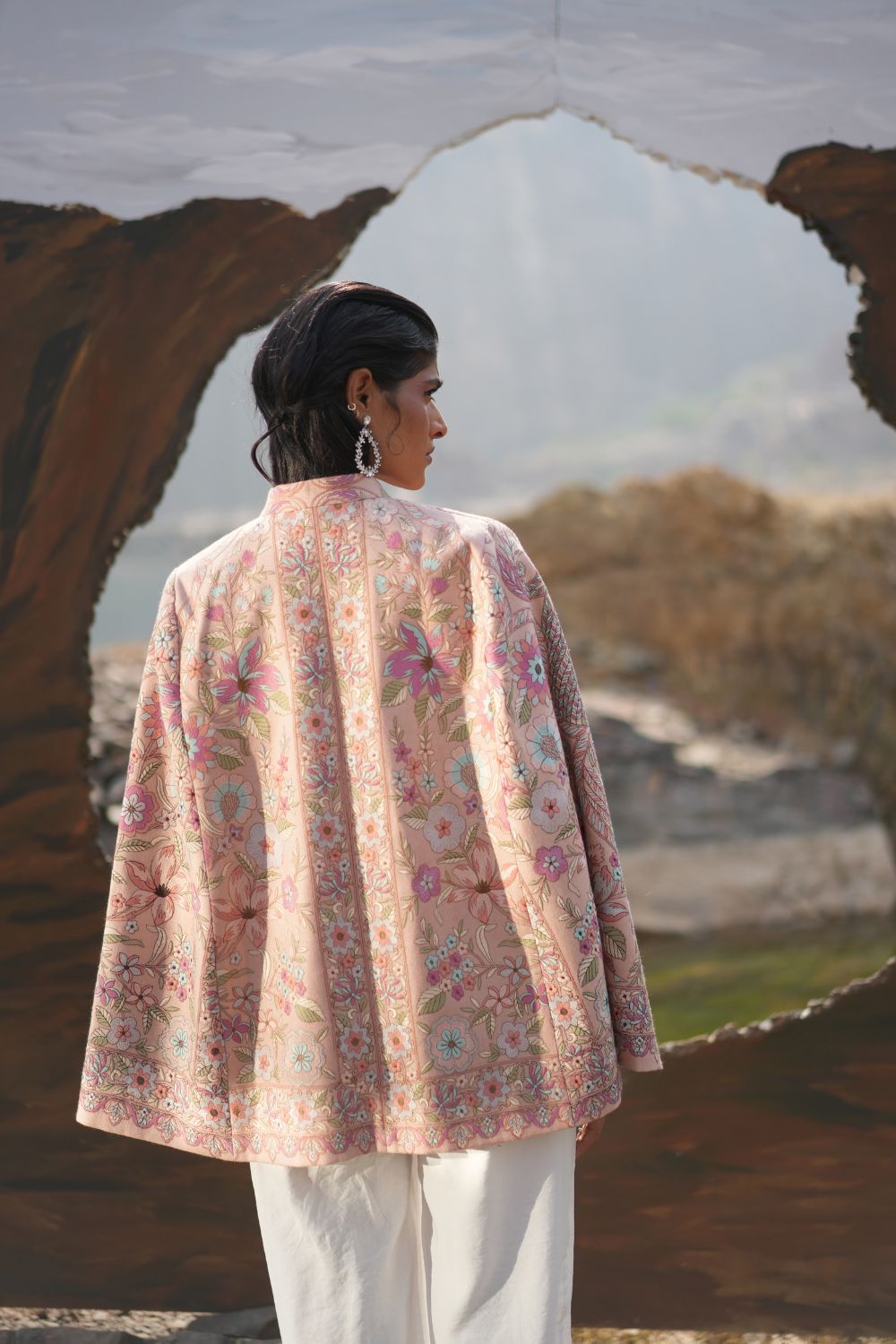 JOBAN SANDHU IN PAISLEY SWIRL CAPE