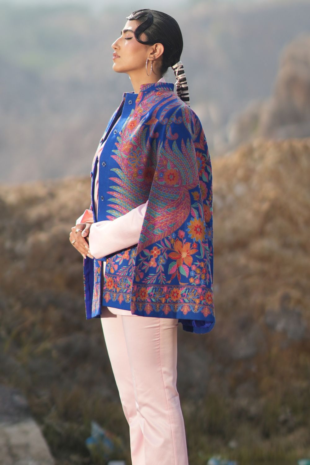 JOBAN SANDHU IN PAISLEY SWIRL CAPE