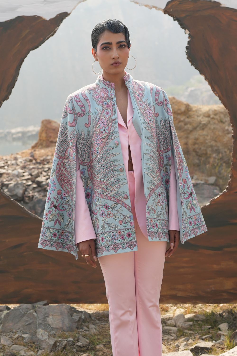 JOBAN SANDHU IN PAISLEY SWIRL CAPE