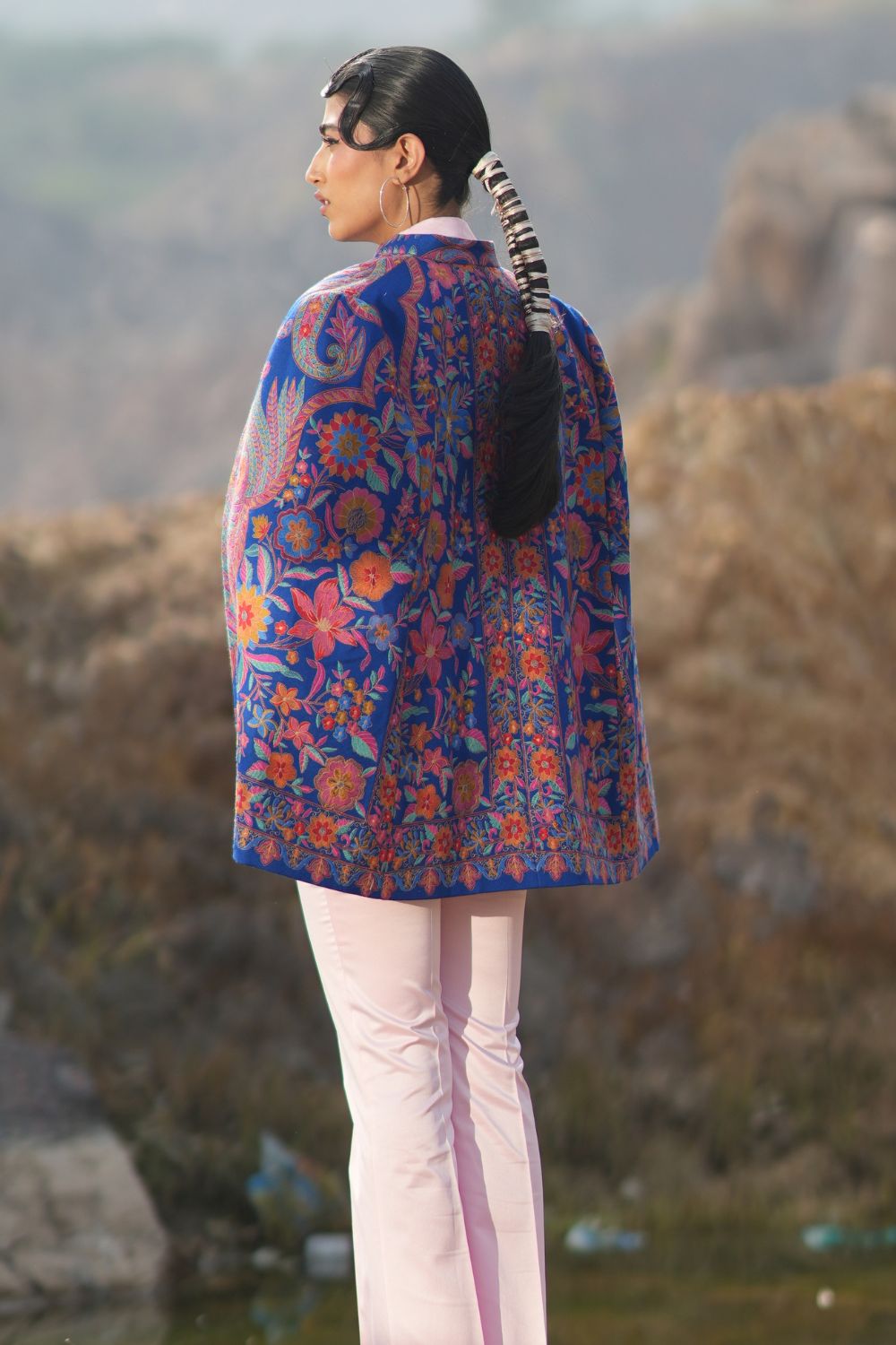 JOBAN SANDHU IN PAISLEY SWIRL CAPE