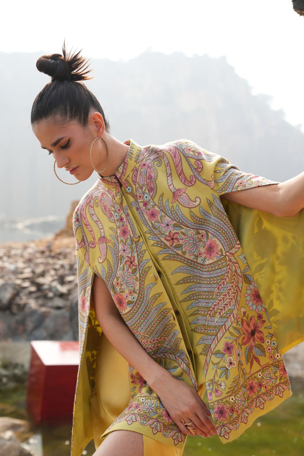 JOBAN SANDHU IN PAISLEY SWIRL CAPE