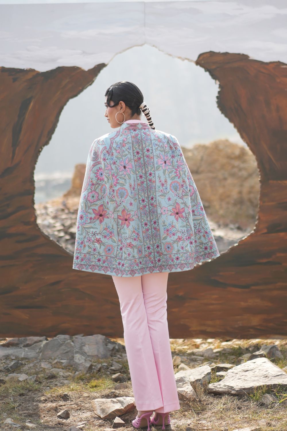 JOBAN SANDHU IN PAISLEY SWIRL CAPE
