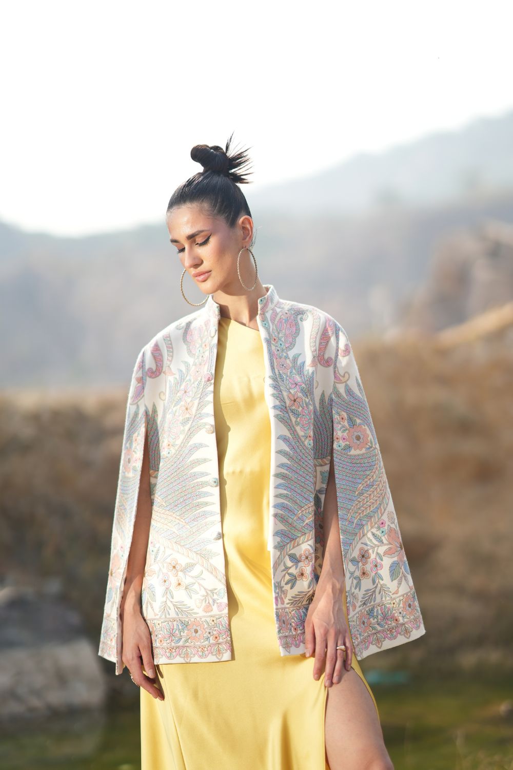 JOBAN SANDHU IN PAISLEY SWIRL CAPE